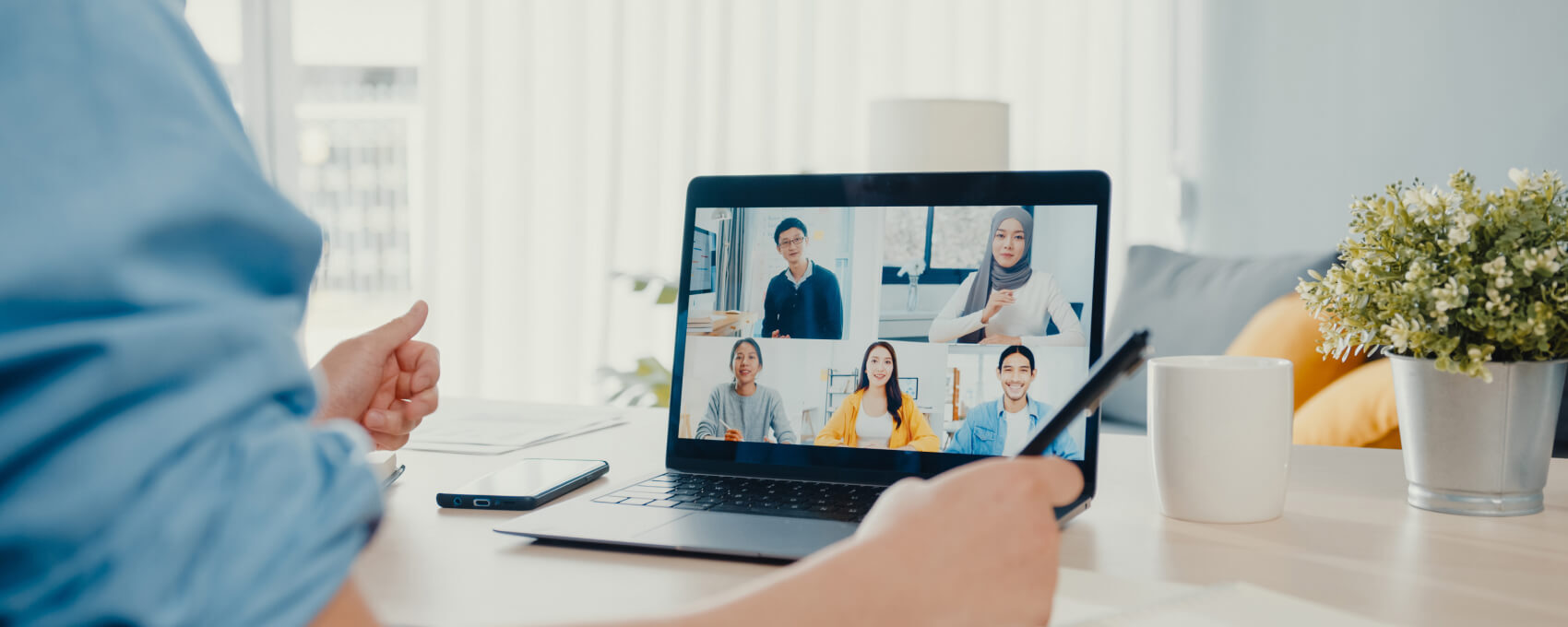 A zoom call in progress on a laptop screen